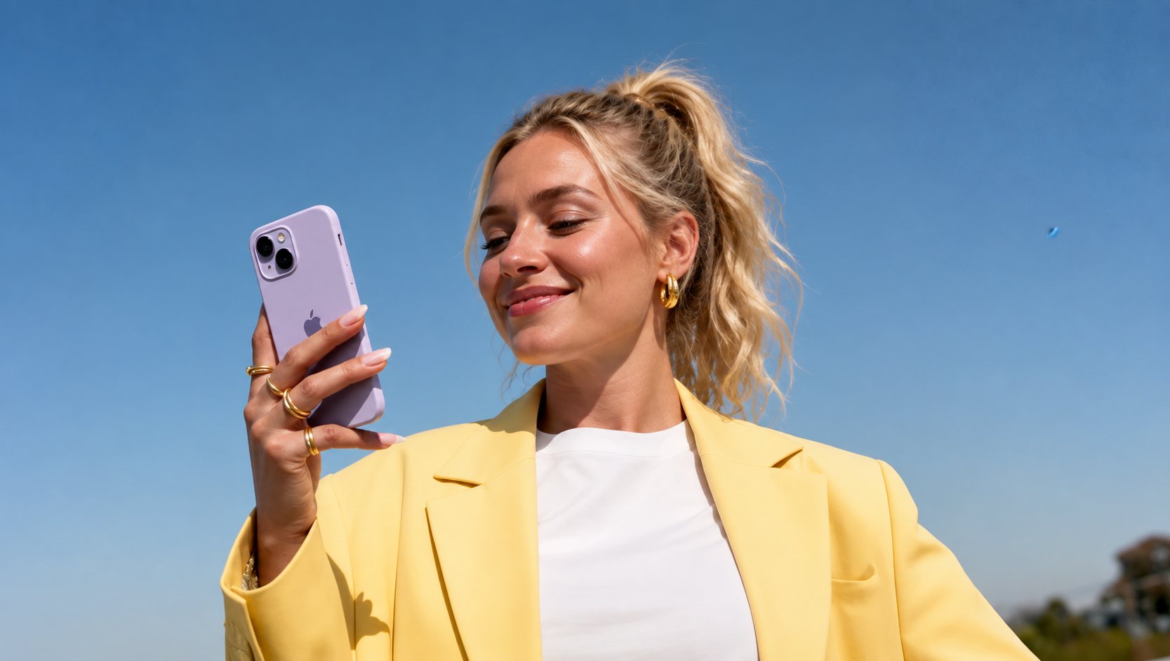 A buyer smiling at a finished quote on her phone
